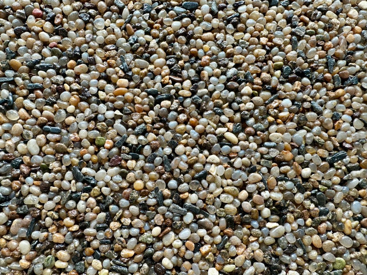 Close-up of a natural multicolour pebble surface